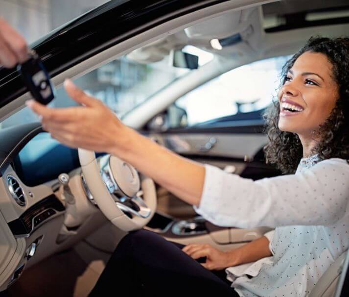 Woman using car rental services